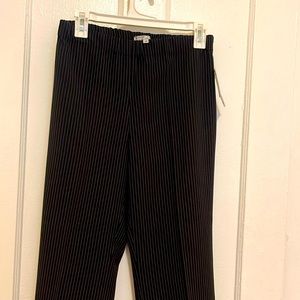 Black pinstriped dress pants by Alberto Makali.